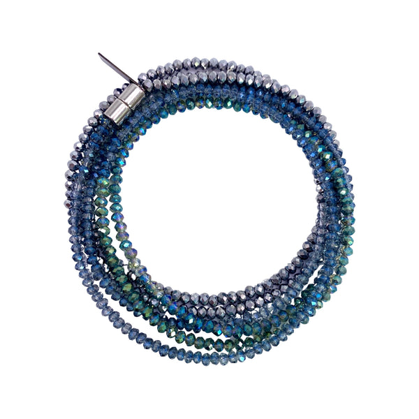 Millianna Single Strand Wrap - Mermaid - Available at Shaylula Jewlery & Gifts in Tarrytown, NY and online. The perfect, versatile, go-to staple in your jewelry wardrobe! With 5 ways to wear it, you're going to want one in every color! Hand-beaded microcut crystal strand that can be a necklace or wrap bracelet. Talk about making a statement!  • Cut crystal  • 43" L  • Magnetic clasp