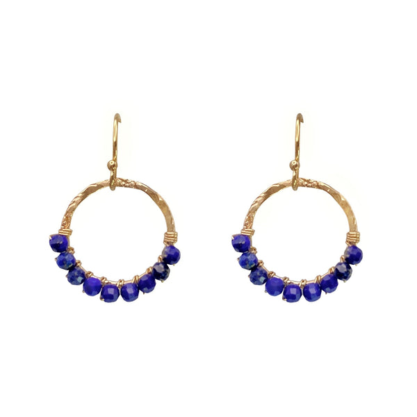 Sonya Renee Full Circle Necklace & Earring Set - Available at Shaylula Jewlery & Gifts in Tarrytown, NY and online. This Shaylula Exclusive set is comprised of the ever favorite Full Circle Necklace & Earrings, and is one of our best sellers! Bright Lapis beads are wire wrapped around a hammered gold filled frame and hangs from a delicate chain. Even prettier with the matching earrings, they make a fabulous gift for any one in your circle of friends. • Lapis, 14k gold filled