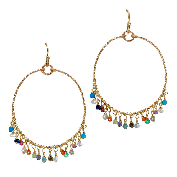 Sonya Renee Y Not Necklace & Earring Set - Available at Shaylula Jewlery & Gifts in Tarrytown, NY and online. This Shaylula Exclusive set is comprised of the ever favorite Y Not Necklace & Fiesta Hoops and is one of our best sellers! The simple necklace features multi-colored gemstone droplets on a thin cable chain. The delicate, featherweight hoops have a clustered fringe of semi-precious stones and look beautiful on everyone. Very shimmery! • Semi-precious stones, 14k gold filled