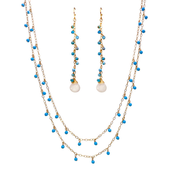 Sonya Renee Yes Please Necklace & Earring Set - Available at Shaylula Jewlery & Gifts in Tarrytown, NY and online. This Shaylula Exclusive set is comprised of the ever favorite Yes Please Necklace & Earrings, and is one of our best sellers! The double strand necklace features turquoise drops on a shimmer chain. The delicate, linear drop earrings have a cascade of turquoise beads and is finished with a wire wrapped moonstone briolette. Feminine and sexy! • Turquoise, moonstone, 14k gold filled