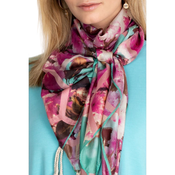 Johnny Was Hunny Ride Scarf Available at Shaylula Jewlery & Gifts in Tarrytown, NY and online. This season-less silk scarf will keep you looking chic and will spoil you with the soft, smooth touch. The tassels not only give the scarf a boho vibe, but also add a bit of weight for graceful draping. However you style it, the Hunny Ride Scarf will add the finishing touch to your look. • 100% Silk • 44"W x 44"L • Hand wash; dry flat