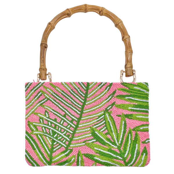 Tiana NY Palm Beach Beaded Bag available at Shaylula Jewlery & Gifts in Tarrytown, NY and online.This cheery handmade beaded bag is petite but is still big enough to hold all your essentials and it has a zipper closure to keep everything safe! It features a bamboo handle and a satin lining with a small interior pocket. • 8.5" W x 6" H