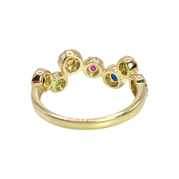 Confetti Rainbow & Diamond Ring Available at Shaylula Jewlery & Gifts in Tarrytown, NY and online. This playful ring features rubies, sapphires, emeralds and citrines surrounded by a halo of white diamonds set in 14k yellow gold. The perfectaddition to your ring party!  • 14k, .23 ct dia, .46 ct colored gems  • Size