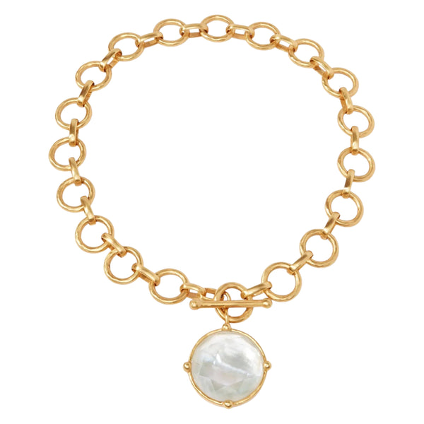 Julie Vos Honeybee Statement Necklace Available at Shaylula Jewlery & Gifts in Tarrytown, NY and online.Faceted sparkling imported glass with mother of pearl doublet on a lightly hammered link, finished with a front toggle closure. Cameo bee on reverse side. (Shown in white for scale) • 24K gold plate, imported glass, mother of pearl • 19" L