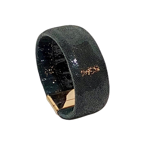 With a background in contemporary art, Marino Pesavento, shapes precious material into new forms creating real pieces of wearable art. His coated leather bracelet has an organic, sensuous look and feel and features a user-friendly magnetic clasp. Available at Shaylula Jewlery & Gifts in Tarrytown, NY and online. 