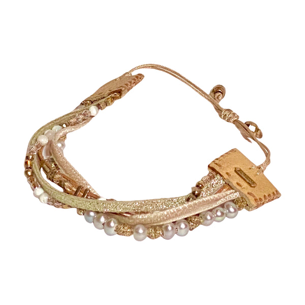 Chan Luu is the OG of LA bohemian style, and has been a favorite of fashion mavens and celebrities for over 25 years. This multi-strand bracelet mixes pearls, velvet, leather and Swarovski crystals for and instant layered look. Available at Shaylula Jewlery & Gifts in Tarrytown, NY and online.