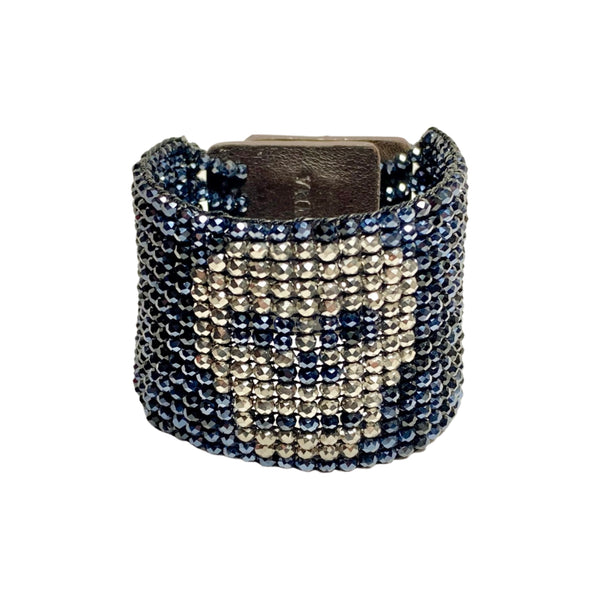 Millianna Crystal Skull Cuff Bracelet - Embrace your inner glam rocker with this hand loomed cut crystal and pyrite cuff. Python skin magnetic closure. Available at Shaylula Jewlery & Gifts in Tarrytown, NY and online.Embrace your inner glam rocker with this hand loomed cut crystal and pyrite cuff. Python skin magnetic closure. 