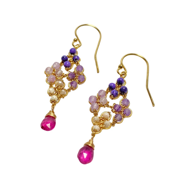 These  Michelle Pressler delicate chandelier earrings balance rich detail with modern simplicity, in harmonious colors reminiscent of hyacinth flowers.  Available at Shaylula Jewlery & Gifts in Tarrytown, NY
