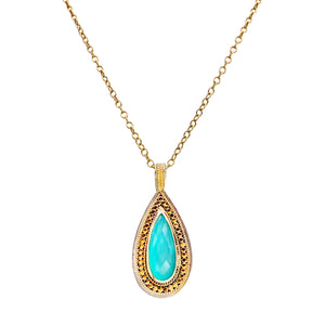 Anna Beck Turquoise Doublet Teardrop Pendant Necklace - Available at Shaylula Jewlery & Gifts in Tarrytown, NY and online. Her turquoise doublet pendant provides an energizing pop of color that will simply make you happy. Doublets are composite gemstones where one stone is layered over another; these doublets are quartz layered over turquoise which gives them a luminescent quality. • 18k gold vermeil, sterling silver, quartz-turquoise doublet • 16" - 18" L adjustable • Lobster clasp