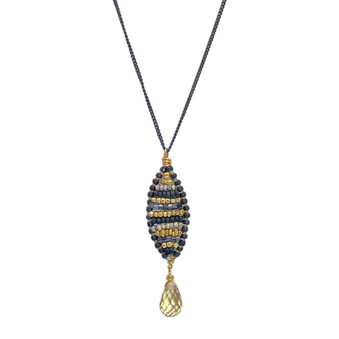 Dana Kellin Honeybee Necklace - Available at Shaylula Jewlery & Gifts in Tarrytown, NY and online. Alternating stripes of gold seed beads, pyrite and blackened silver beads create a graphic pattern that pops!  • 14k gold filled, blackened sterling silver, pyrite, champagne citrine  • 16.5" L chain, 1.75" L x .375" W pendant  • Lobster clasp