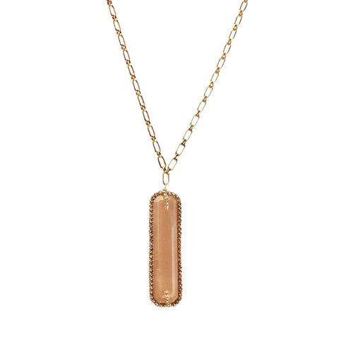 Dana Kellin Peach Moonstone Necklace - Available at Shaylula Jewlery & Gifts in Tarrytown, NY and online. This warm, neutral moonstone pendant is framed with Dana Kellin's signature  wire-wrapped crystals and makes a perfect foundation piece for layering!  • Peach moonstone, crystal, 14k gold filled  • 28.5" L chain, 1.75" L x .5" W pendant  • Lobster clasp