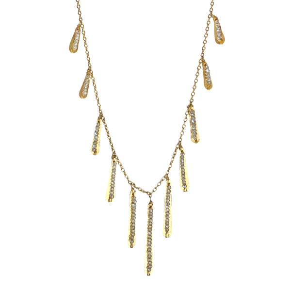 Dana Kellin Gold Fringe Necklace - This sassy Dana Kellin necklace has all the right moves; the hand-hammered fringe dances while the smokey crystals sparkle as they catch the light. Wear it for a night out or add a little extra something to your jeans and t-shirt. Available at Shaylula Jewlery & Gifts in Tarrytown, NY and online. • 14k gold filled, crystal • 30" L • Lobster clasp