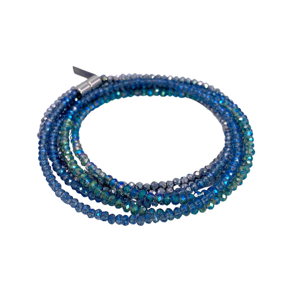 Millianna Single Strand Wrap - Mermaid - Available at Shaylula Jewlery & Gifts in Tarrytown, NY and online. The perfect, versatile, go-to staple in your jewelry wardrobe! With 5 ways to wear it, you're going to want one in every color! Hand-beaded microcut crystal strand that can be a necklace or wrap bracelet. Talk about making a statement!  • Cut crystal  • 43" L  • Magnetic clasp