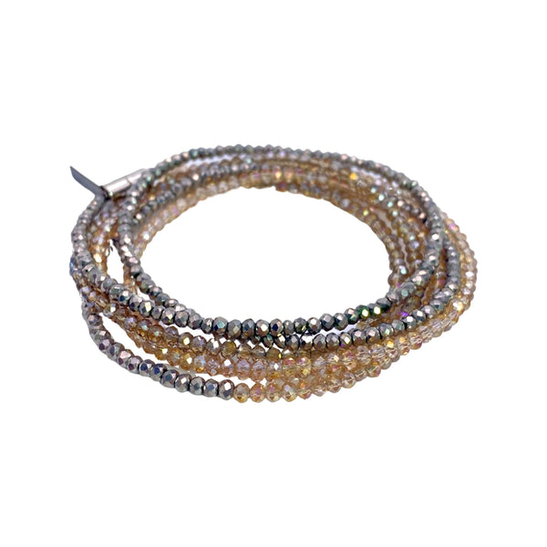 Millianna Single Strand Wrap - Sand Ombre - Available at Shaylula Jewlery & Gifts in Tarrytown, NY and online. The perfect, versatile, go-to staple in your jewelry wardrobe! With 5 ways to wear it, you're going to want one in every color! Hand-beaded microcut crystal strand that can be a necklace or wrap bracelet. Talk about making a statement!  • Cut crystal  • 43" L  • Magnetic clasp