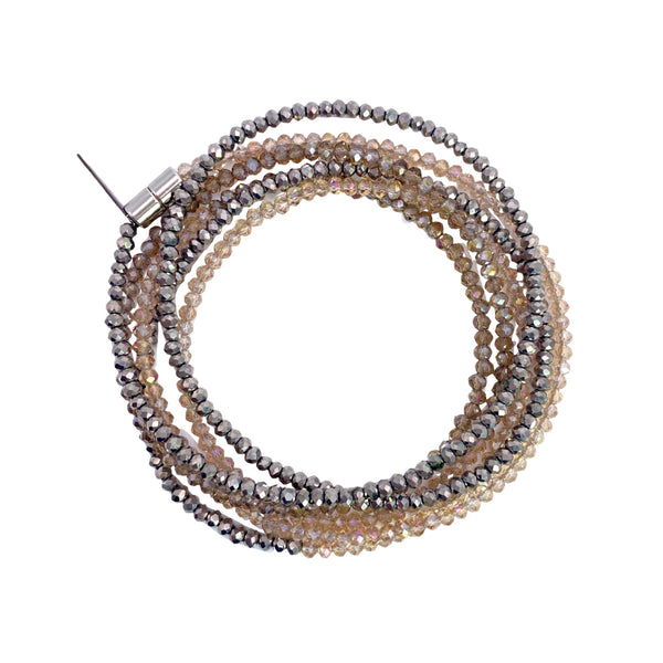Millianna Single Strand Wrap - Sand Ombre - Available at Shaylula Jewlery & Gifts in Tarrytown, NY and online. The perfect, versatile, go-to staple in your jewelry wardrobe! With 5 ways to wear it, you're going to want one in every color! Hand-beaded microcut crystal strand that can be a necklace or wrap bracelet. Talk about making a statement!  • Cut crystal  • 43" L  • Magnetic clasp