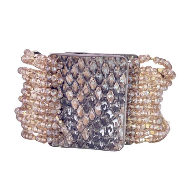 Millianna Emerald Crystal Cuff Bracelet - Available at Shaylula Jewlery & Gifts in Tarrytown, NY and online. Glitzy hand beaded cut crystal cuff with emerald rhinestones reminiscent of the days of Gatsby. Python skin magnetic closure.   • Cut crystal, python skin  • 6.5" L x 1.5" W