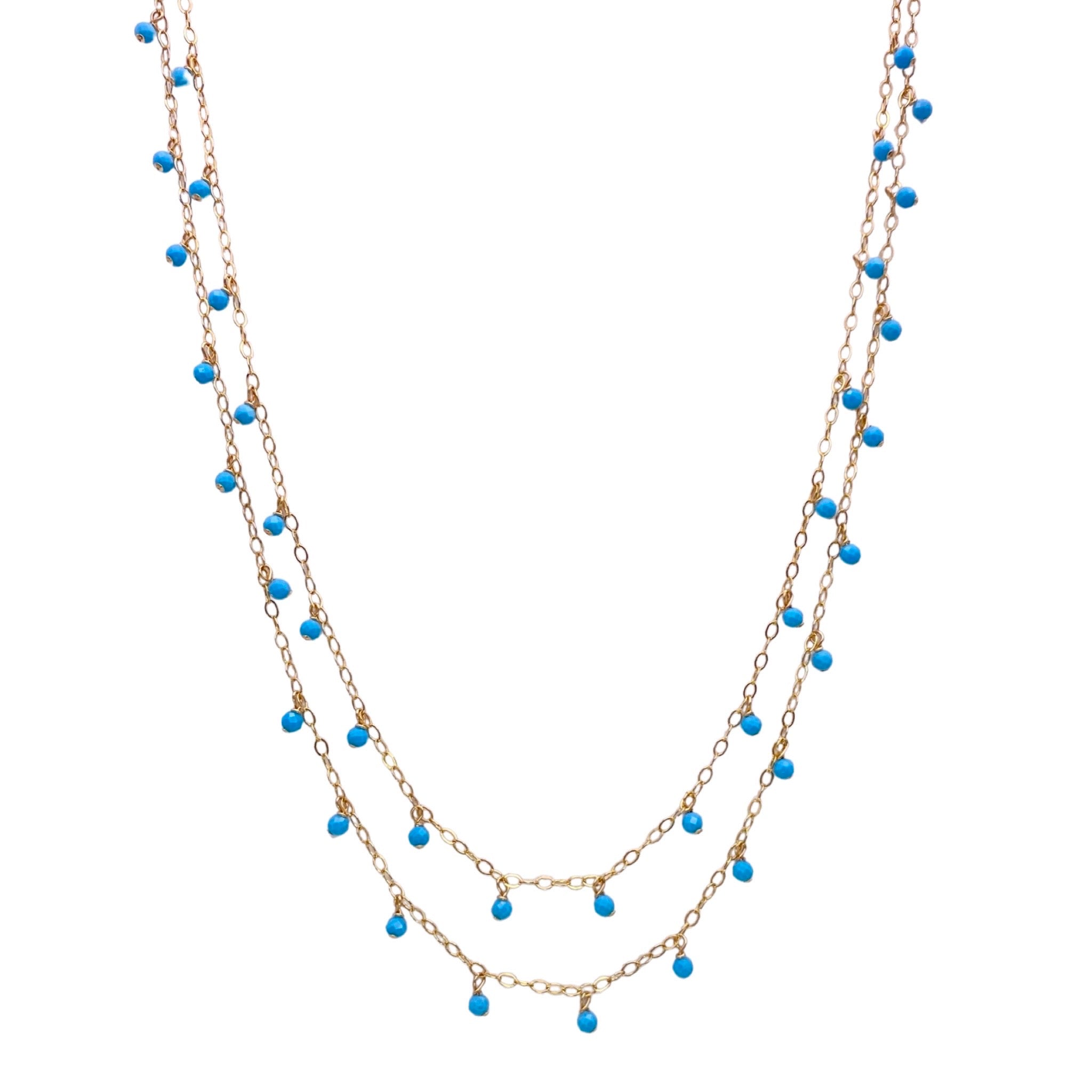 Sonya Renee Yes Please Necklace & Earring Set - Available at Shaylula Jewlery & Gifts in Tarrytown, NY and online. This Shaylula Exclusive set is comprised of the ever favorite Yes Please Necklace & Earrings, and is one of our best sellers! The double strand necklace features turquoise drops on a shimmer chain. The delicate, linear drop earrings have a cascade of turquoise beads and is finished with a wire wrapped moonstone briolette. Feminine and sexy! • Turquoise, moonstone, 14k gold filled 
