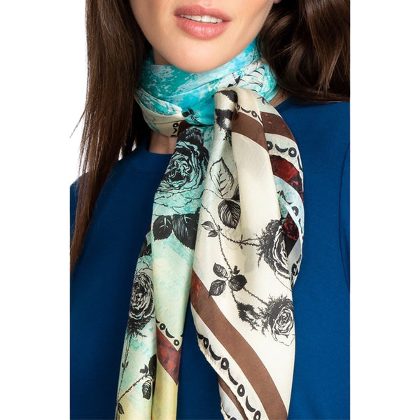 Johnny Was Emilia Scarf Available at Shaylula Jewlery & Gifts in Tarrytown, NY and online.This season-less silk scarf will keep you looking chic and will spoil you with the soft, smooth touch. The tassels not only give the scarf a boho vibe, but also add a bit of weight for graceful draping. However you style it, the Emilia Scarf will add the finishing touch to your look. • 100% Silk • 44"W x 44"L • Hand wash; dry flat