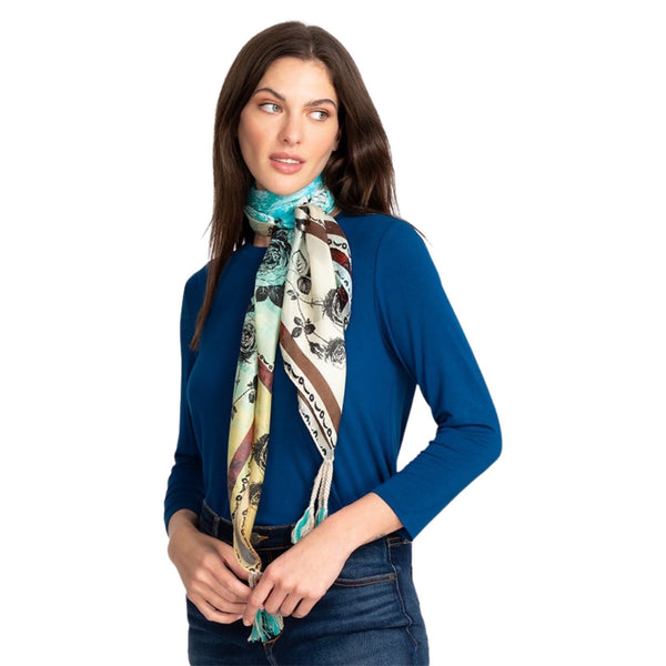 Johnny Was Emilia Scarf Available at Shaylula Jewlery & Gifts in Tarrytown, NY and online.This season-less silk scarf will keep you looking chic and will spoil you with the soft, smooth touch. The tassels not only give the scarf a boho vibe, but also add a bit of weight for graceful draping. However you style it, the Emilia Scarf will add the finishing touch to your look. • 100% Silk • 44"W x 44"L • Hand wash; dry flat