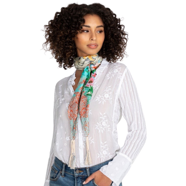 Johnny Was Lace Garden Scarf Available at Shaylula Jewlery & Gifts in Tarrytown, NY and online. The soft floral blooms and vivid botanical print pop against the light background of this season-less silk scarf. The tassels not only give the scarf a boho vibe, but also add a bit of weight for graceful draping. However you style it, the Lace Garden Scarf will add the finishing touch to your look. • 100% Silk • 44"W x 44"L • Hand wash; dry flat