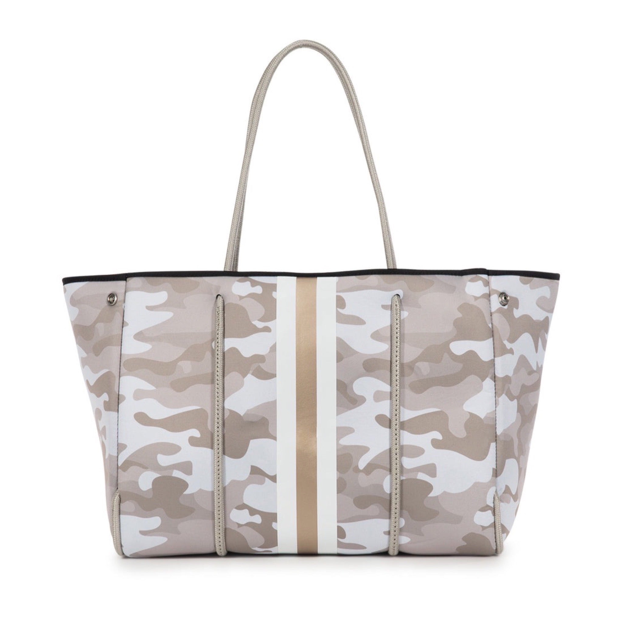 Haute Shore Greyson Sahara Camo Tote Bag available at Shaylula Jewlery & Gifts in Tarrytown, NY and online. The Greyson is our favorite everyday tote. Designed to last, this neoprene tote is the perfect blend of luxury, style and functionality to take on the go! Think of it as the funky, vegan, little sister to LV's Neverfull... It even includes a removable zipper pouch.  • Neoprene  • Bag - 18" W x  12" H x 10" D; Strap - 10.25"; Pouch - 8.5" W x 6" H