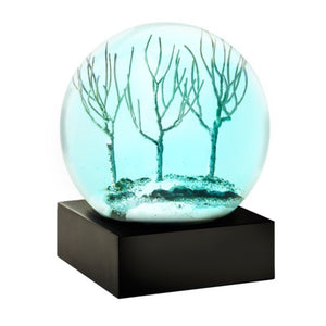 Cool Snow Globes Winter Evening Snow Globe available at Shaylula Jewlery & Gifts in Tarrytown, NY and online. This dreamy snow globe depicts the cool blue of evening light casting a glow over the winter landscape. Footsteps in the snow, the solitude of a walk in twilight... Everything is quiet and peaceful. • 4.5" H x 4" D