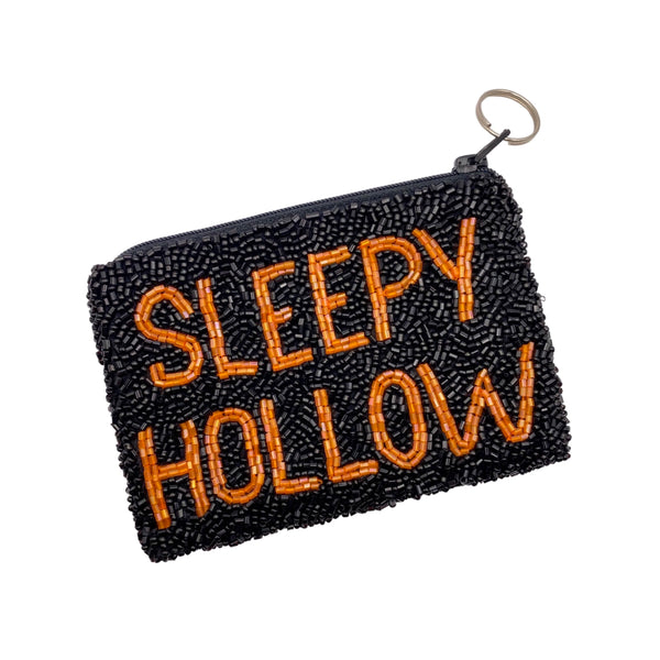 Tiana NY Sleepy Hollow Skull Coin Purse available at Shaylula Jewlery & Gifts in Tarrytown, NY and online. This Shaylula exclusive beaded coin purse is handmade just for us. It's big enough to fit your keys, credit cards & lip gloss. Comes with a zipper and key ring.  • 5" W x 3.5" H