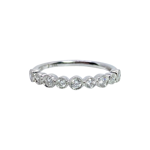 Milgrain Half Eternity Diamond Band Available at Shaylula Jewlery & Gifts in Tarrytown, NY and online. This milgrain half eternity diamond band makes the perfect wedding band or stacking ring. Mix it with different metals, textures and with rings to create your own unique look.  • 14k, .32 ct dia  • Size