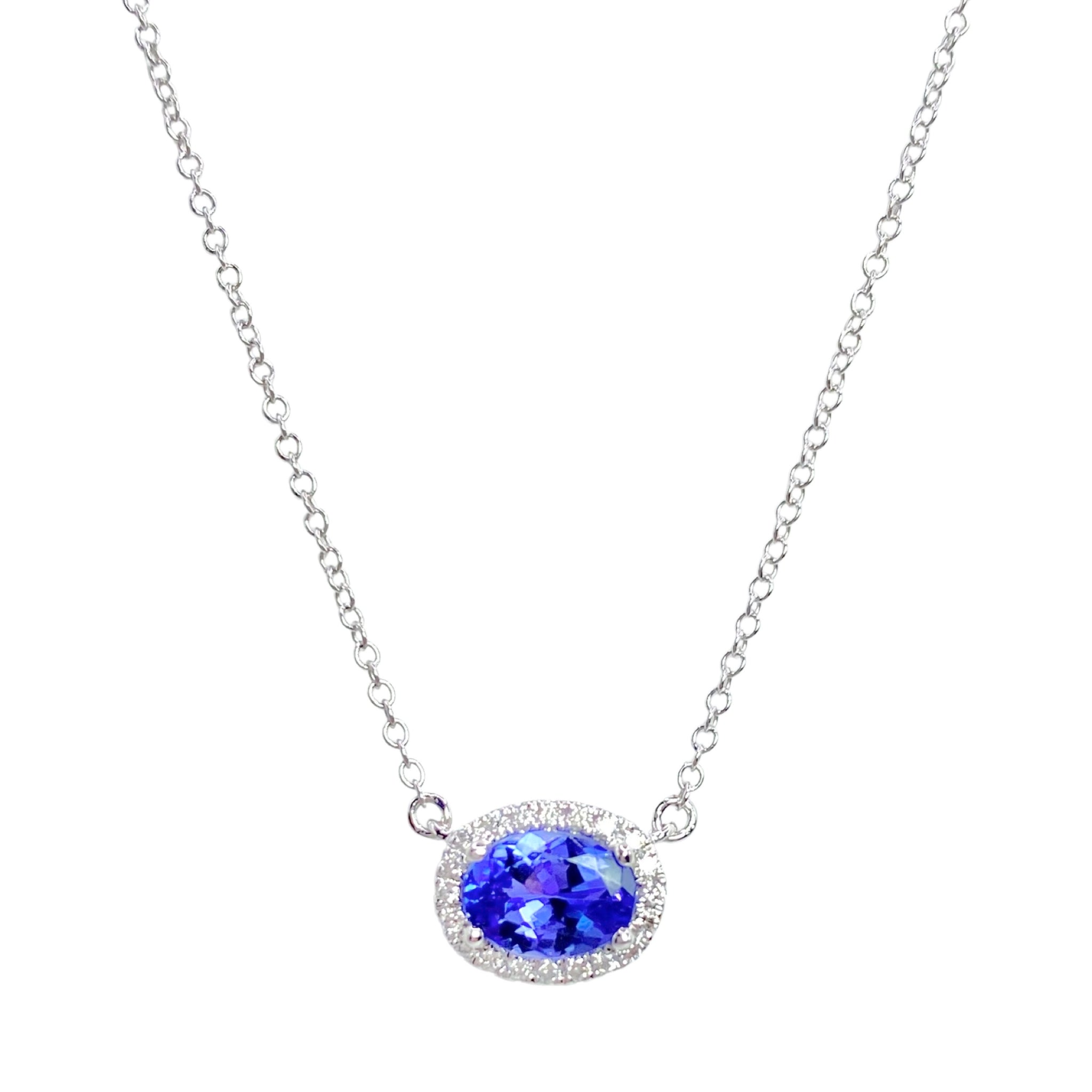 Meira T Tanzanite & Diamond Necklaceavailable at Shaylula Jewlery & Gifts in Tarrytown, NY and online. Stunning - that's the only word for this Meira T tanzanite and diamond necklace! Crafted in 14k white gold and surrounded with a halo of diamonds, this necklace radiates an air of regality.  • 14k, .12 ct dia, .85 ct tanz  • Lobster clasp