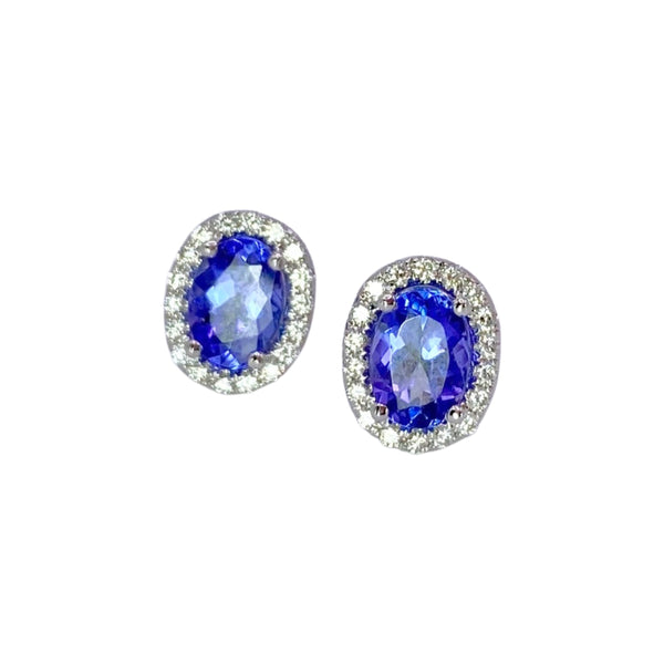 Meira T Tanzanite & Diamond Stud Earrings available at Shaylula Jewlery & Gifts in Tarrytown, NY and online. Stunning - that's the only word for these Meira T tanzanite and diamond studs. Crafted in 14k white gold and surrounded with diamonds they radiate an air of regality.  • 14k, .26 ct dia, 1.80 ct tanzanite  • Post