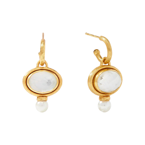 Julie Vos Simone Hoop & Charm Earrings Available at Shaylula Jewlery & Gifts in Tarrytown, NY and online. Julie Vos Simone Hoop & Charm Earrings feature an oval mother of pearl doublet charm and a shimmering capped pearl, suspended from a gilded hoop. Charms are removable and hoops can be worn separately.  • 24K gold plate, mother of pearl doublet, pearl  • 1.5" L