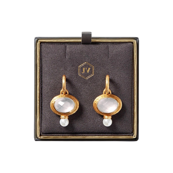 Julie Vos Simone Hoop & Charm Earrings Available at Shaylula Jewlery & Gifts in Tarrytown, NY and online. Julie Vos Simone Hoop & Charm Earrings feature an oval mother of pearl doublet charm and a shimmering capped pearl, suspended from a gilded hoop. Charms are removable and hoops can be worn separately.  • 24K gold plate, mother of pearl doublet, pearl  • 1.5" L