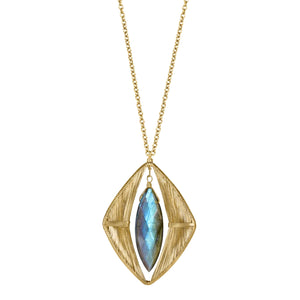 Dana Kellin Showcase Necklace available at Shaylula Jewlery & Gifts in Tarrytown, NY and online. Beautifully detailed striations of fine gauge wire are parted to reveal a dramatic, marquis-shaped labradorite briolette.  • 14k gold fill, labradorite  • 17" L, 1.75" L x 1.25" W pendant  • Lobster clasp