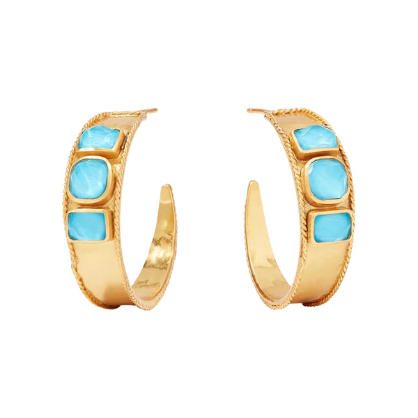 Julie Vos Savoy Statement Hoop Earrings Available at Shaylula Jewlery & Gifts in Tarrytown, NY and online. These Julie Vos Savoy Statement Hoop Earrings feature three iridescent pacific blue doublets on a lightly hammered hoop and are finished with twisted wire detail.  • 24K gold plate, pacific blue mother of pearl doublets  • 1.25" L